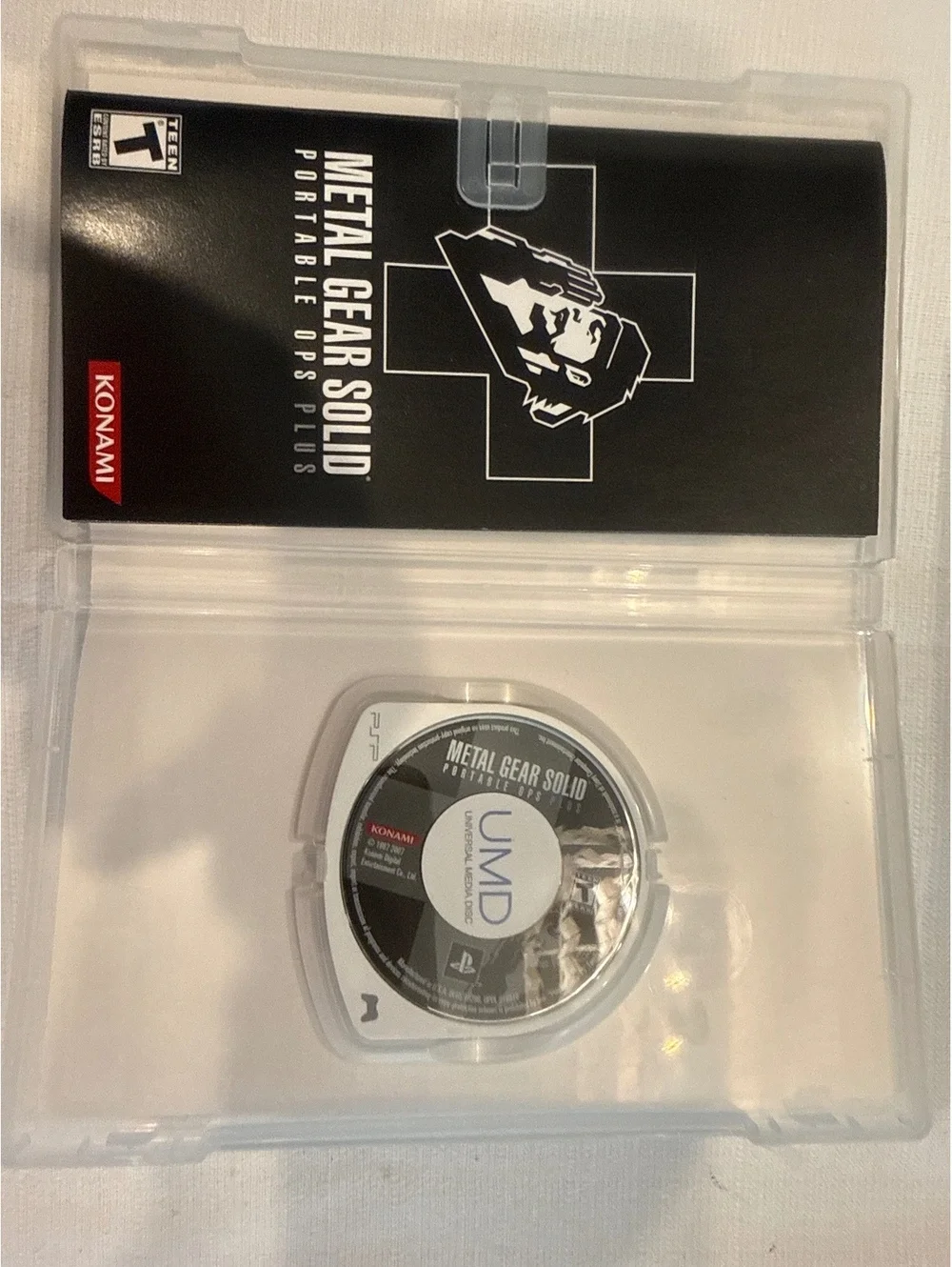 PSP Game Bundle - NFL Street 2 Unleashed, Metal Gear Solid Portable Ops Plus, &